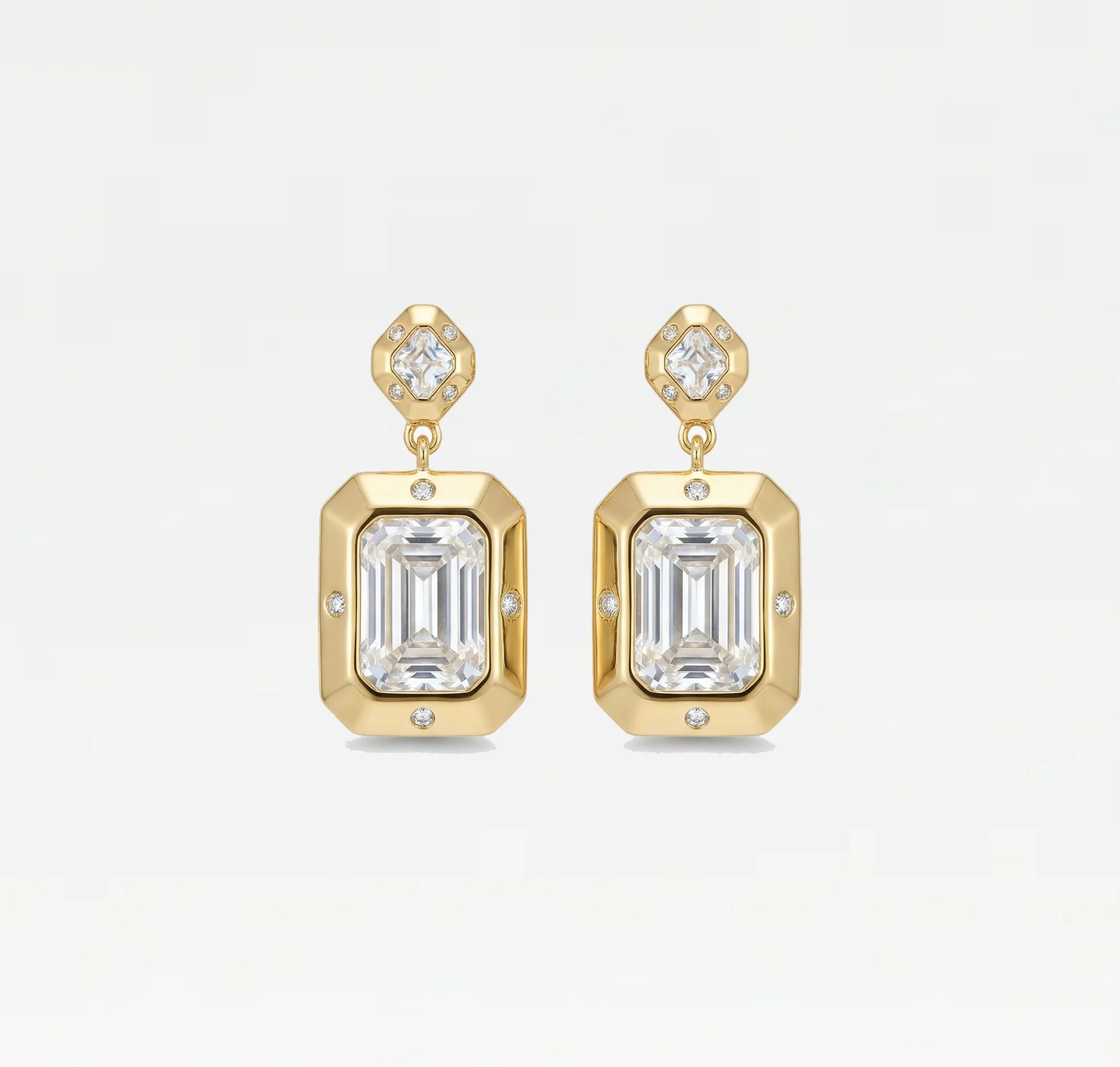 THE ODE EMERALD CUT EARRINGS